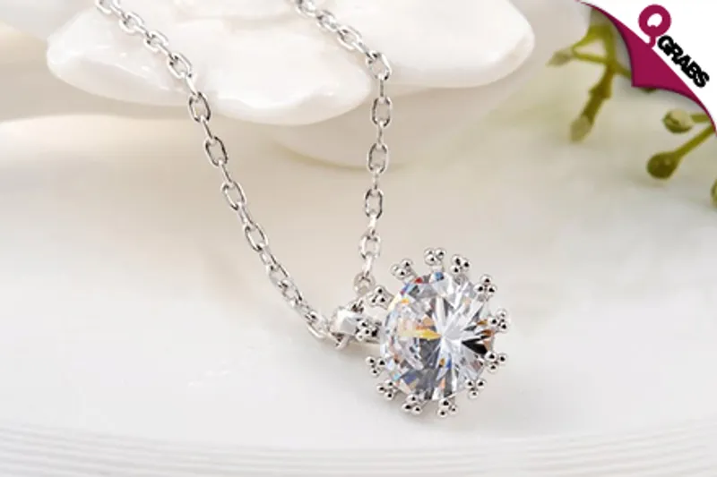 From QR49 Sparkle with a Shimmering Snowflake Crystal Pendant & Earring Set! (Up to QR398 Value)